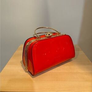 Red glamorous bag never used with big strap